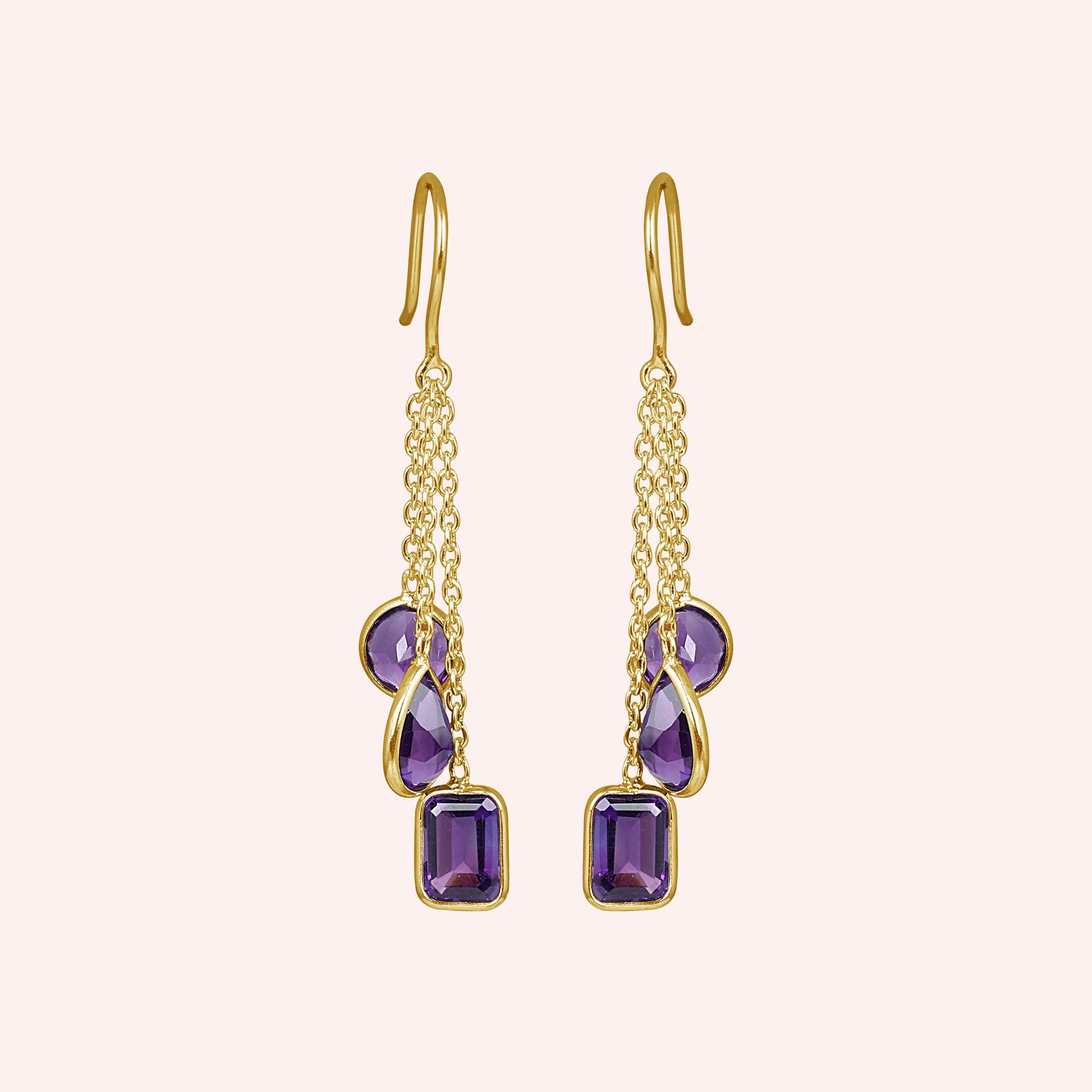 boho_earrings_front_view_gold_plated_chain_drop_amethyst_earrings_with_purple_gemstones_on_soft_pink_background