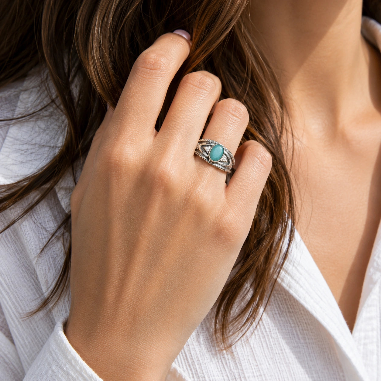 Boho_ring_with_amazonite_stone_gold_plated_silver_with_filigree_texture_worn_by_a_model