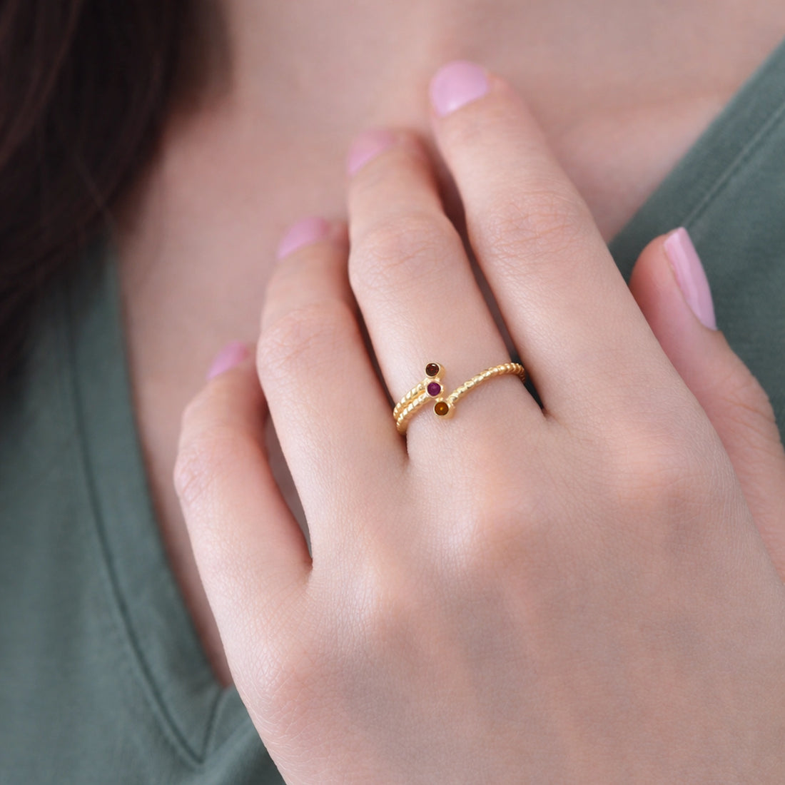 Bubble-ring-with-ruby-carnelian-garnet-gemstones-gold-plated-silver-front-view-on-white-satin-background
