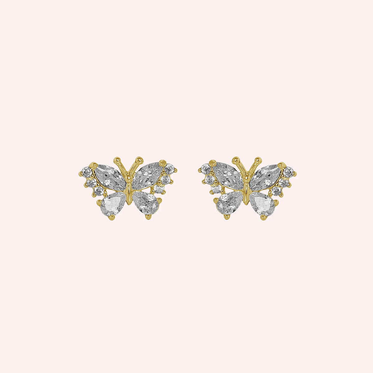 Diamond_butterfly_earrings_in_gold_plated_silver_with_lab_grown_diamonds_at_front_angle_view_on_solid_pink_background
