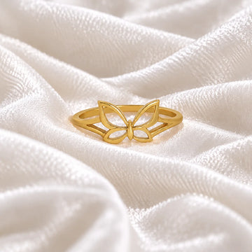 Butterfly_ring_in_gold_plated_silver_at_front_angle_view_on_soft_fabric_background