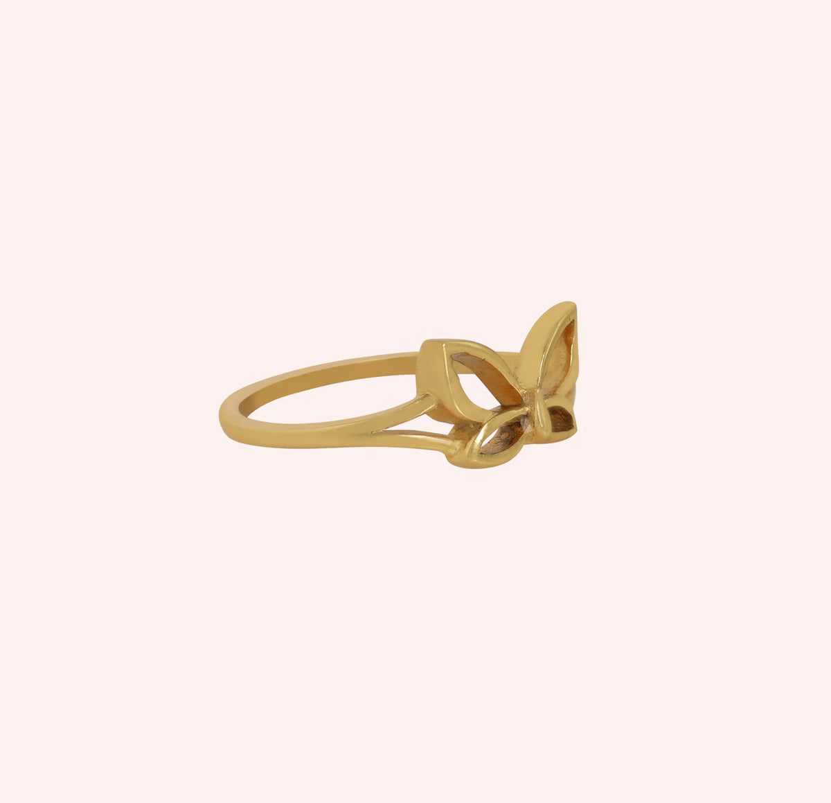 Butterfly_ring_in_gold_plated_silver_at_side_angle_view_on_solid_pink_background