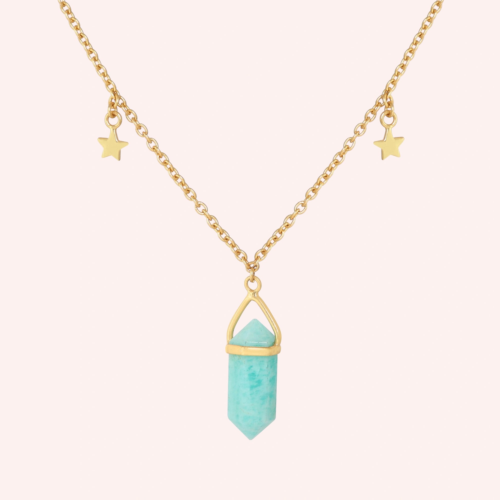 Charm_necklace_in_front_angled_view_with_gold_plated_silver_chain_star_charms_and_amazonite_stone_on_solid_pink_background