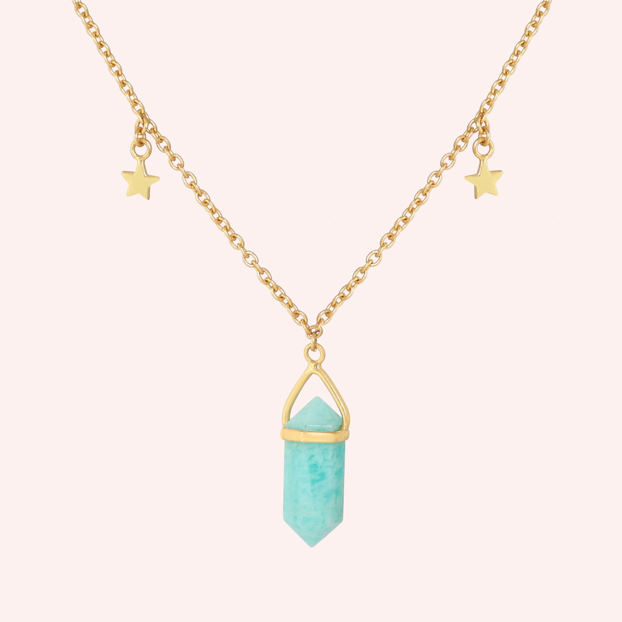 Charm_necklace_in_front_angled_view_with_gold_plated_silver_chain_star_charms_and_amazonite_stone_on_solid_pink_background