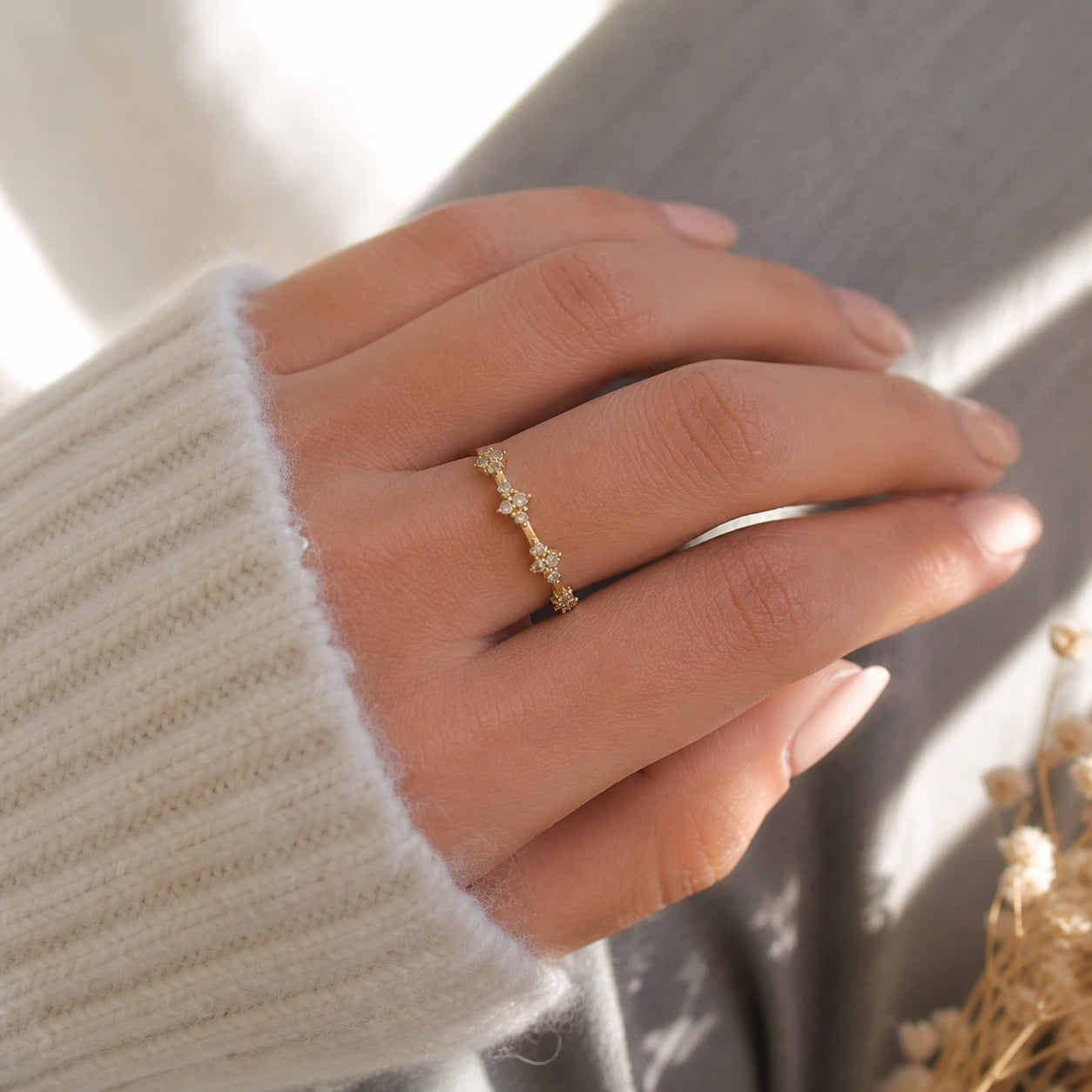 Cluster_ring_gold_plated_silver_band_with_small_clusters_and_labradorite_stones_worn_by_a_model