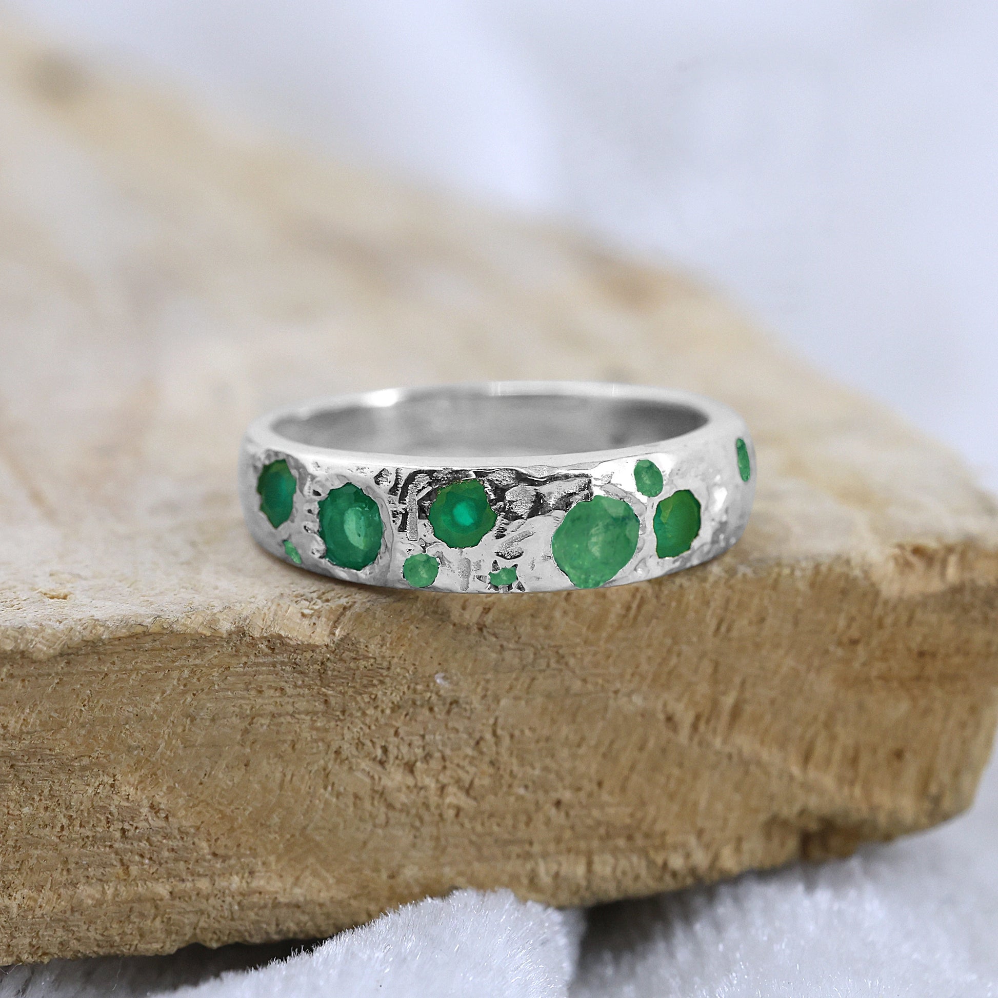 Designer_ring_in_sterling_silver_at_front_angle_featuring_green_onyx_stones
