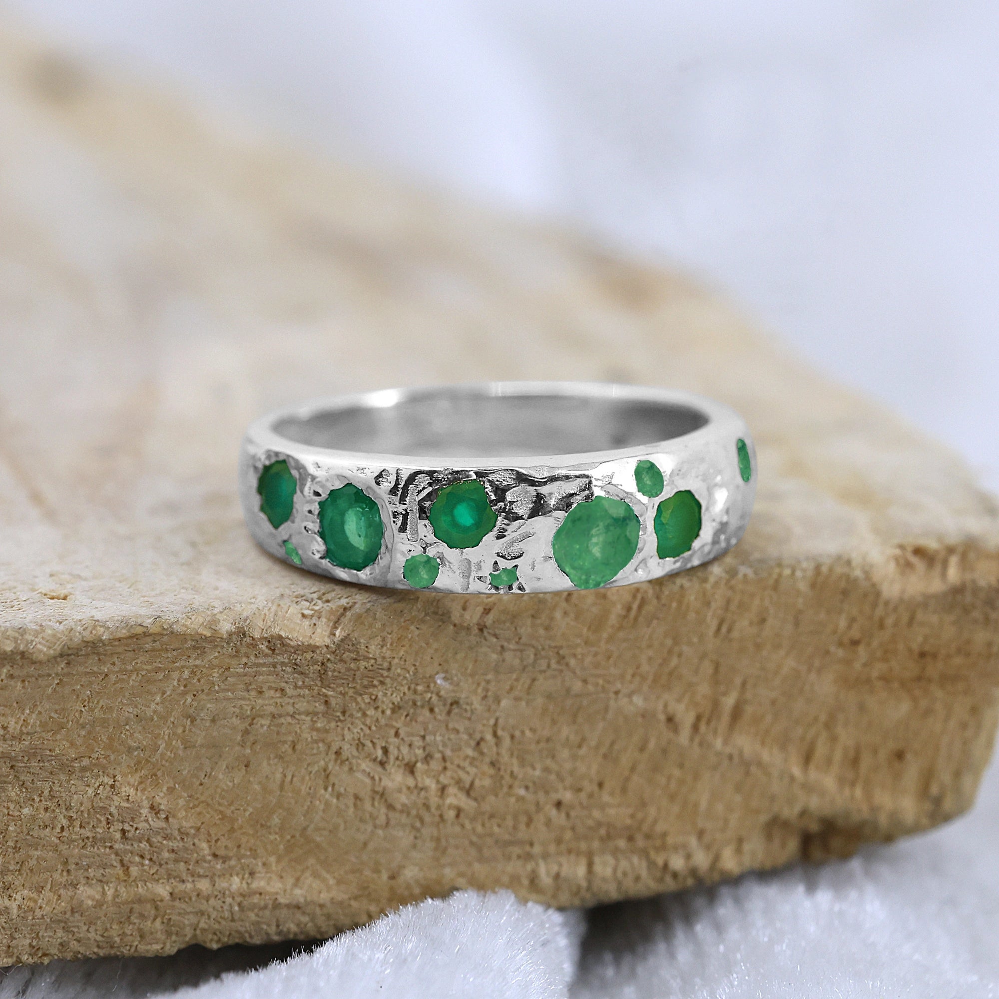 Designer_ring_in_sterling_silver_at_front_angle_featuring_green_onyx_stones