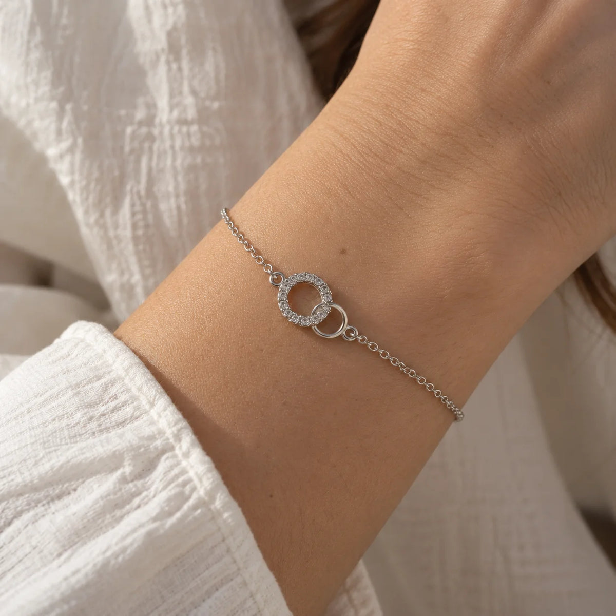 Diamond_bracelet_in_sterling_silver_in_an_interlocking_design_worn_by_a_model