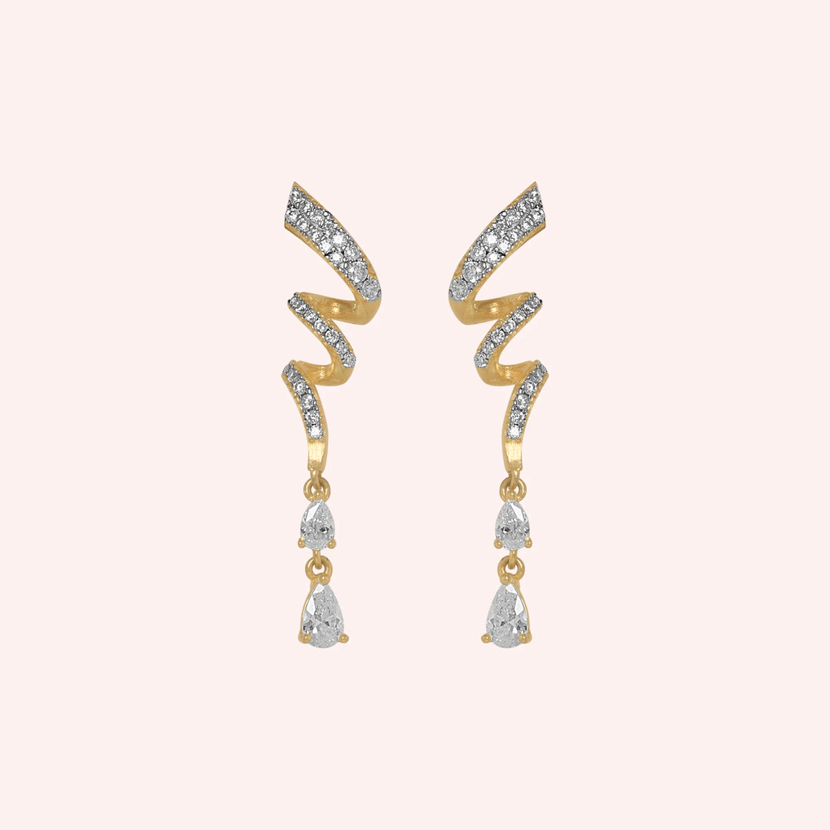 Diamond_drop_earrings_in_gold_plated_silver_with_twisted_design_lab_grown_diamonds_at_front_angle_view_on_solid_pink_background