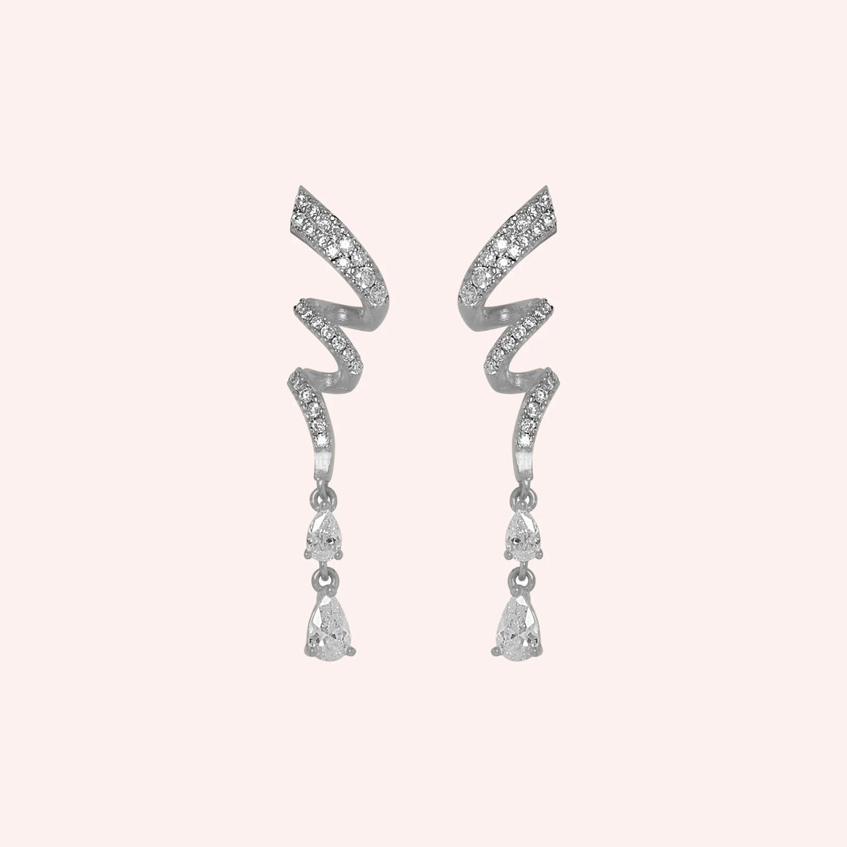 Diamond_drop_earrings_in_sterling_silver_with_twisted_design_lab_grown_diamonds_at_front_angle_view_on_solid_pink_background