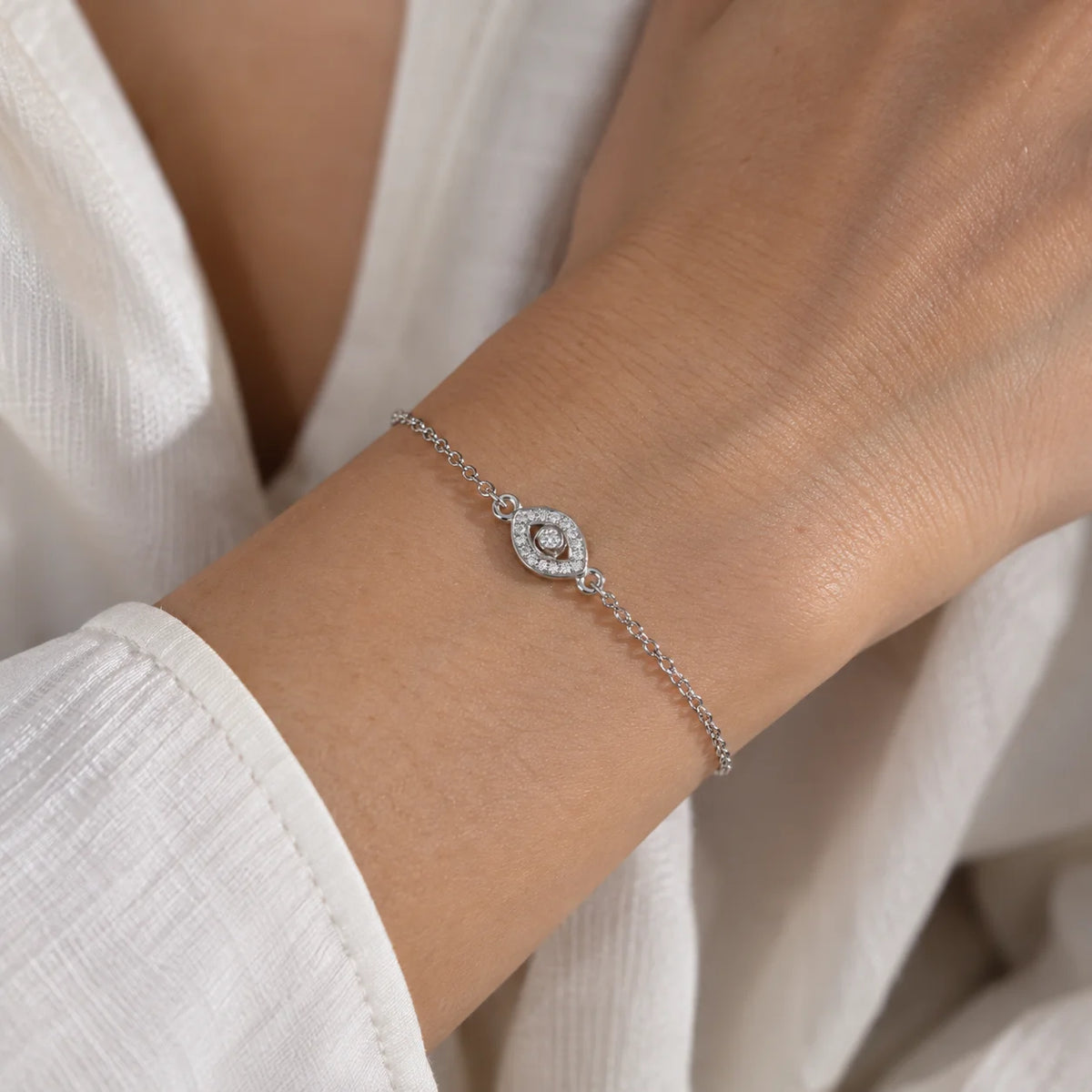 Evil_eye_bracelet_in_sterling_silver_with_lab_grown_diamonds_worn_by_a_model