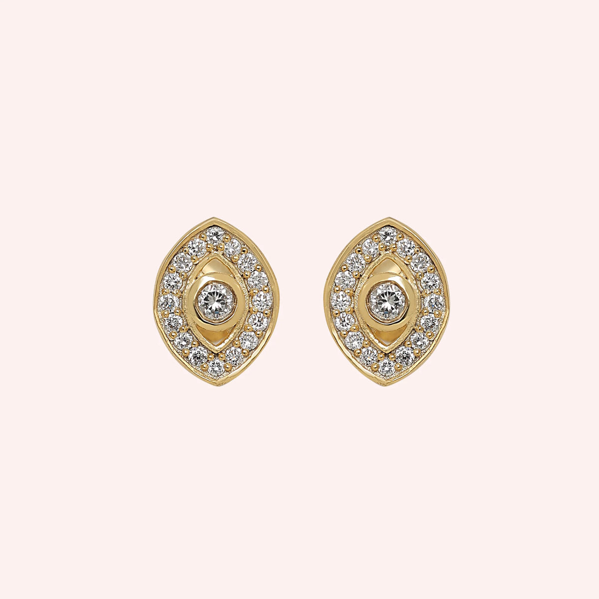 Evil_eye_earrings_in_gold_plated_silver_with_lab_grown_diamonds_at_front_angle_view_on_solid_pink_background