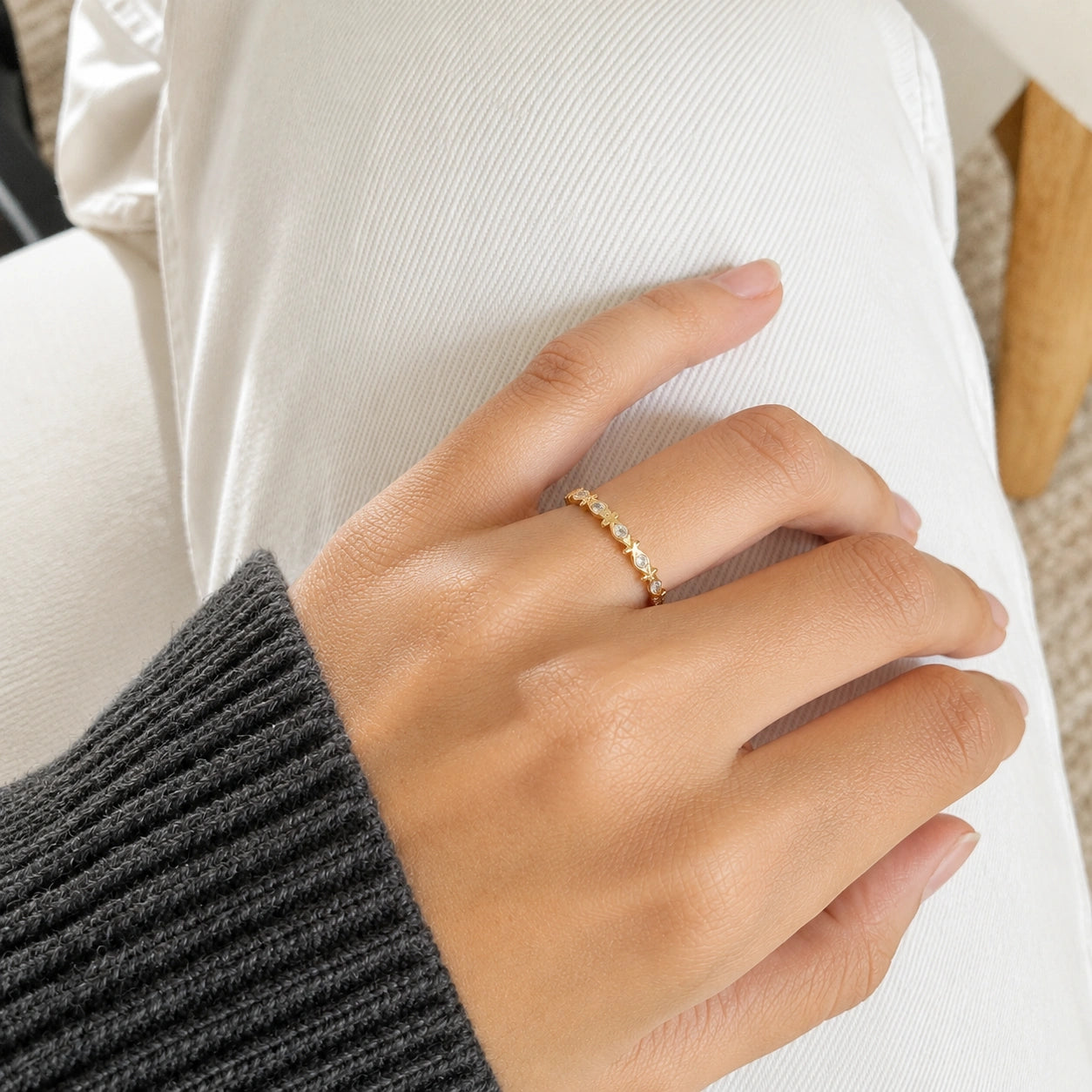Fish_ring_gold_plated_silver_moonstone_eternity_band_worn_by_a_model