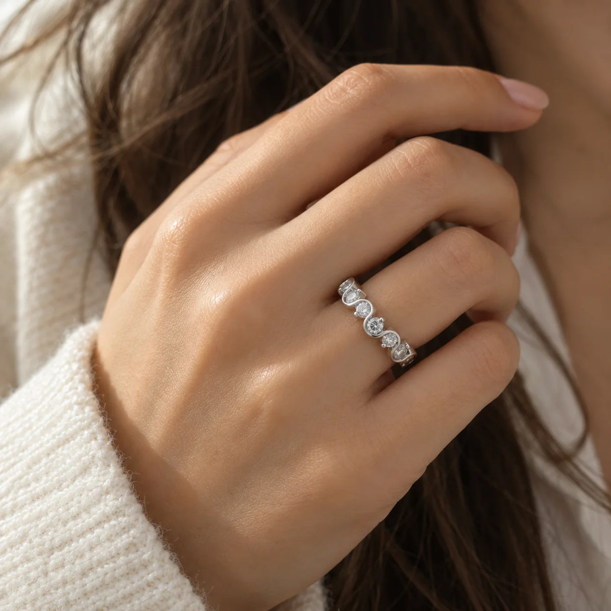 Diamond_ring_in_sterling_silver_with_half_eternity_design_worn_by_a_model