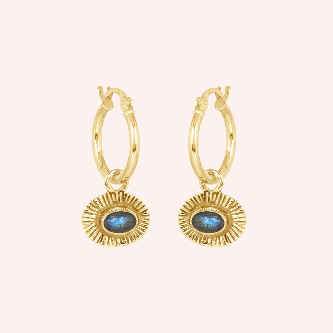 Hoop_earrings_in_gold_plated_silver_with_oval_labradorite_stone_at_front_angle_view_on_solid_pink_background
