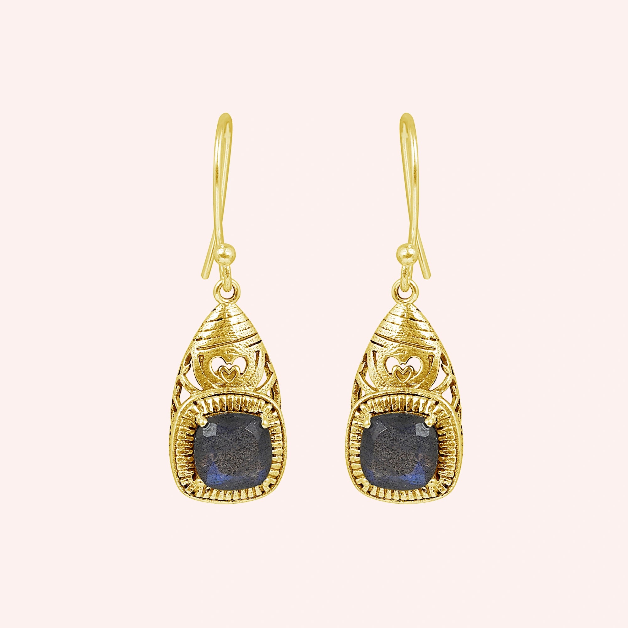 Gold plated gemstone earrings long dangle design with central labradorite stone viewed straight on pink background