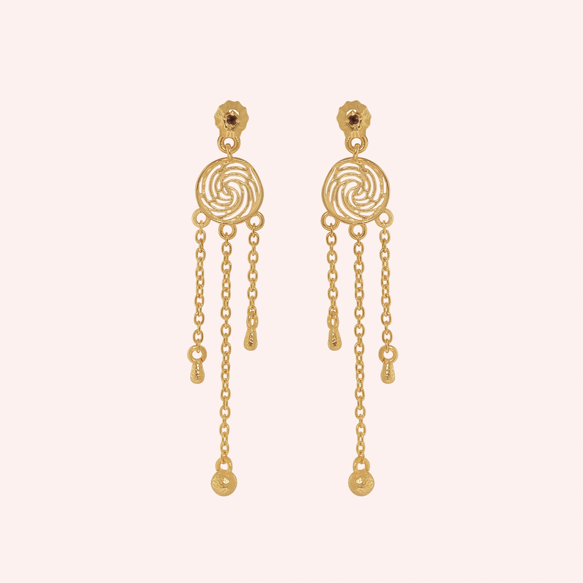 Long_chain_earrings_in_gold_plated_silver_featuring_smoky_quartz_stone_at_front_angle_on_solid_pink_background