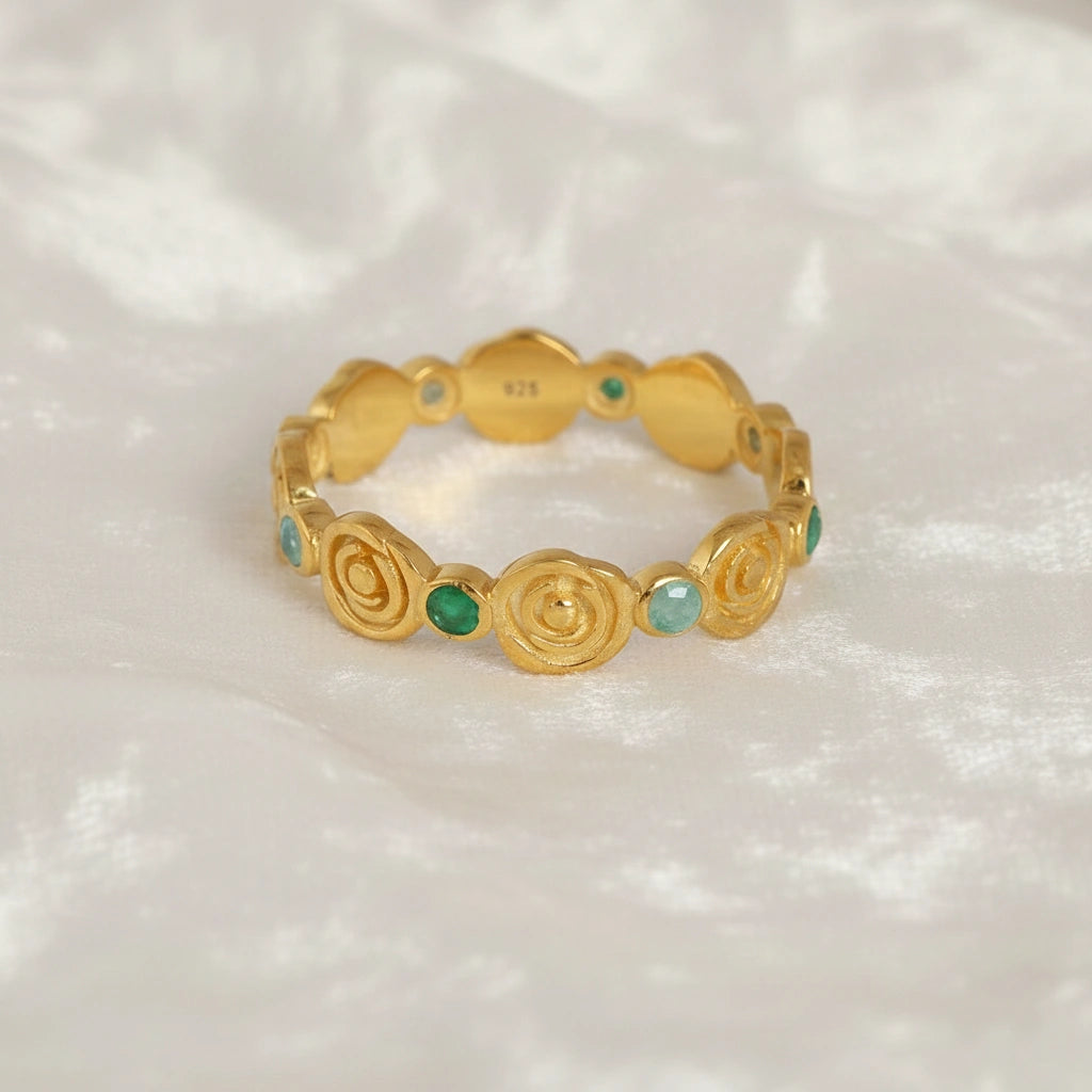 Rose-ring-with-green-and-blue-gemstones-gold-plated-silver-front-view-on-white-satin-background