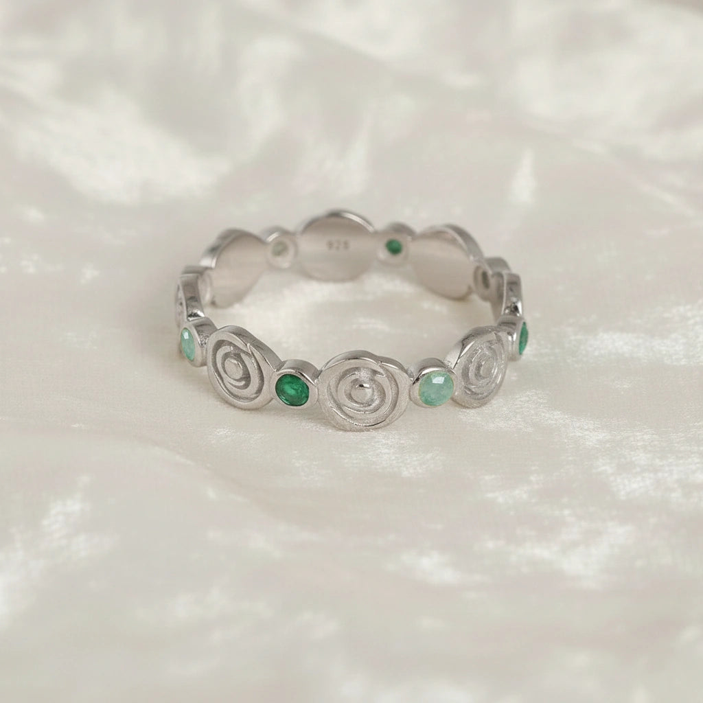 Rose-ring-with-green-and-blue-gemstones-sterling-silver-front-view-on-white-satin-background