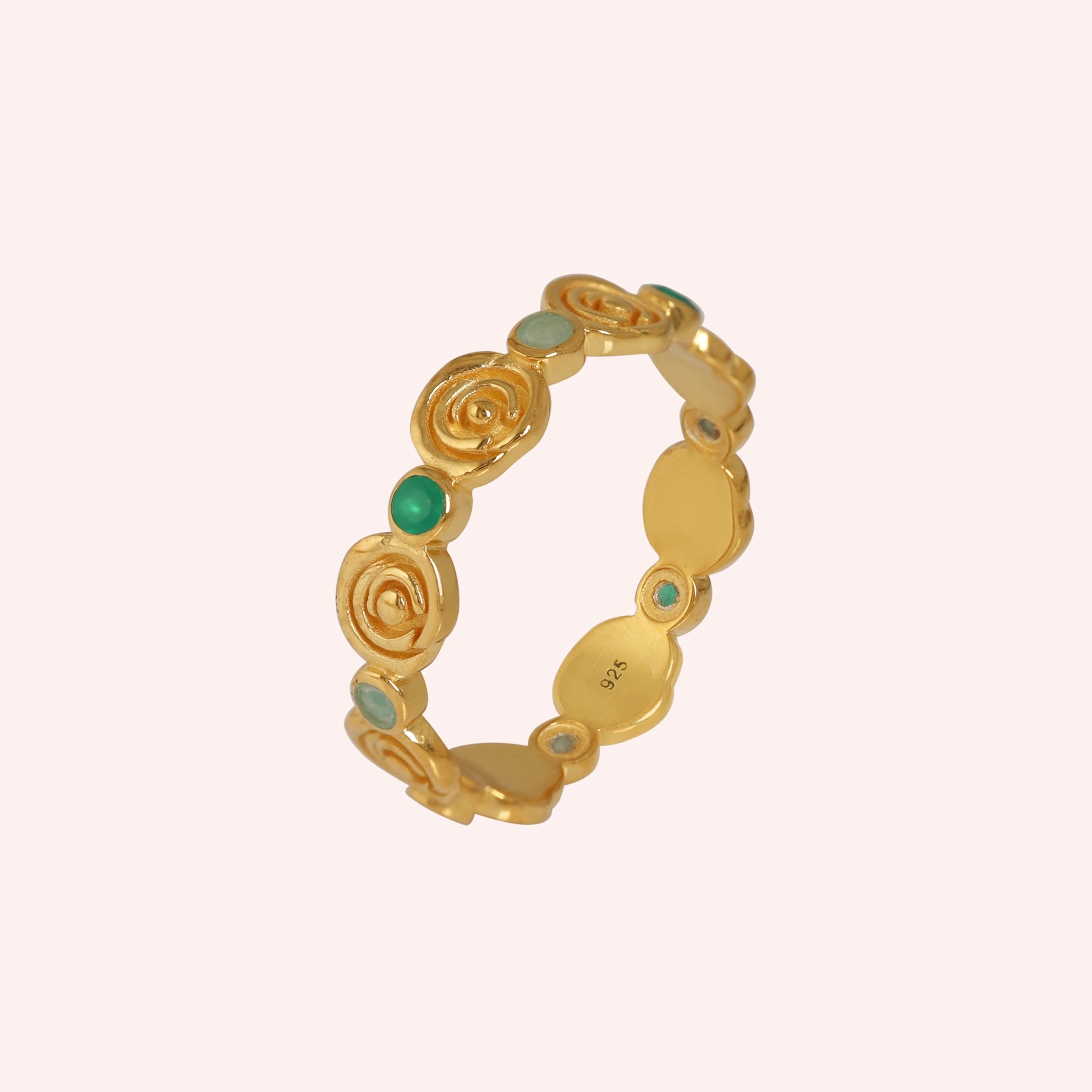 rose-ring-with-green-and-blue-gemstones-gold-plated-silver-angled-view-on-soft-pink-background