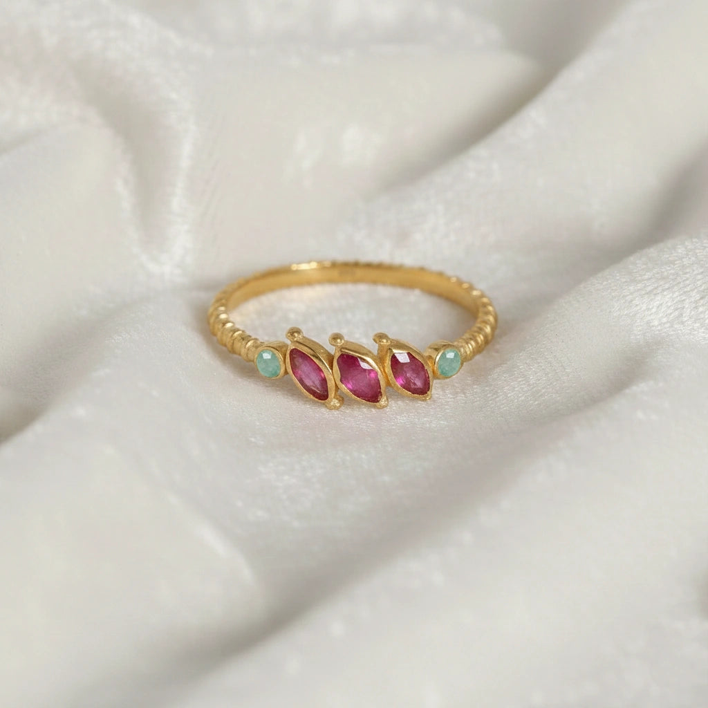 Ruby-ring-with-pink-and-green-gemstones-gold-plated-silver-front-view-on-white-satin-background