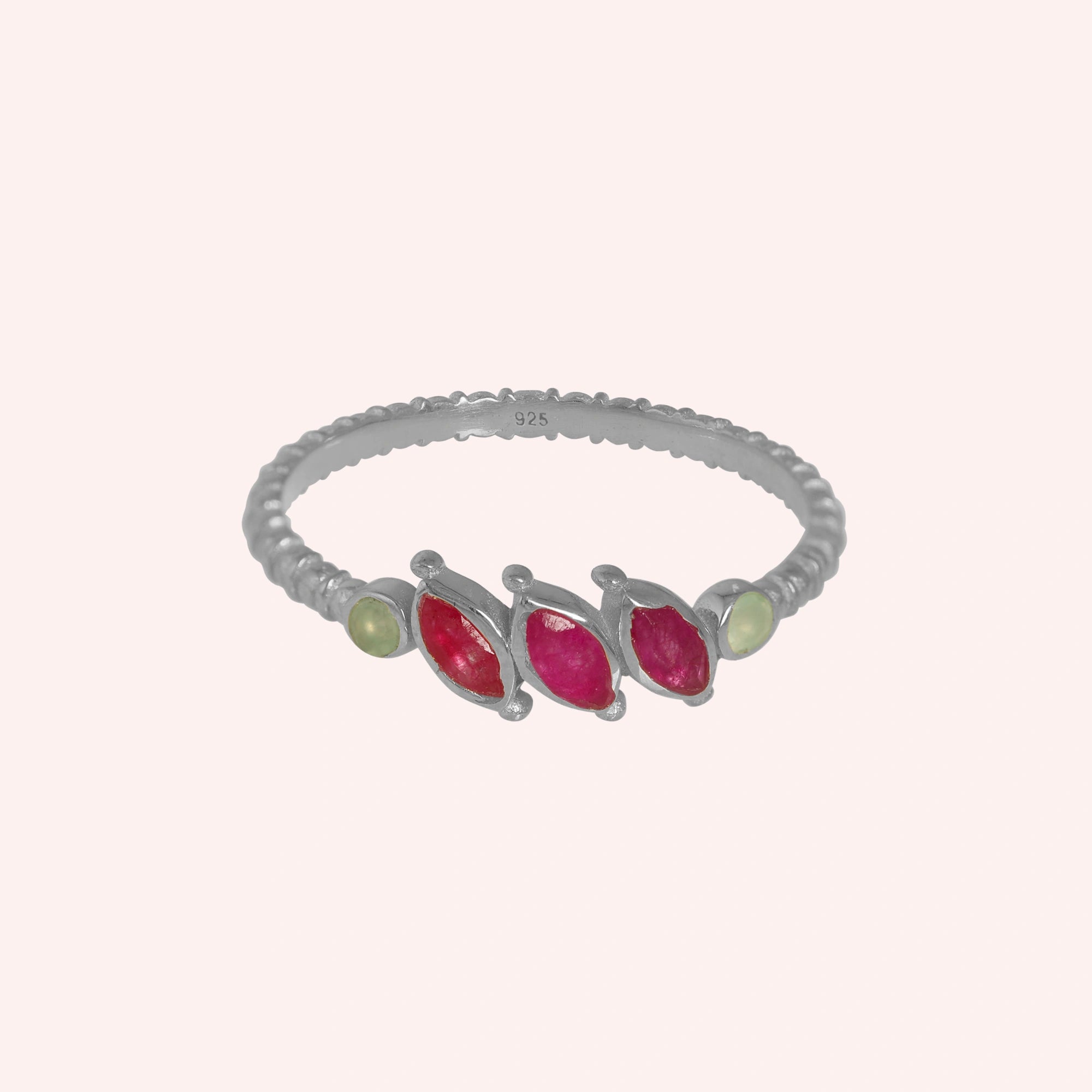 Ruby-ring-with-pink-and-green-gemstones-sterling-silver-front-view-on-solid-pink-background