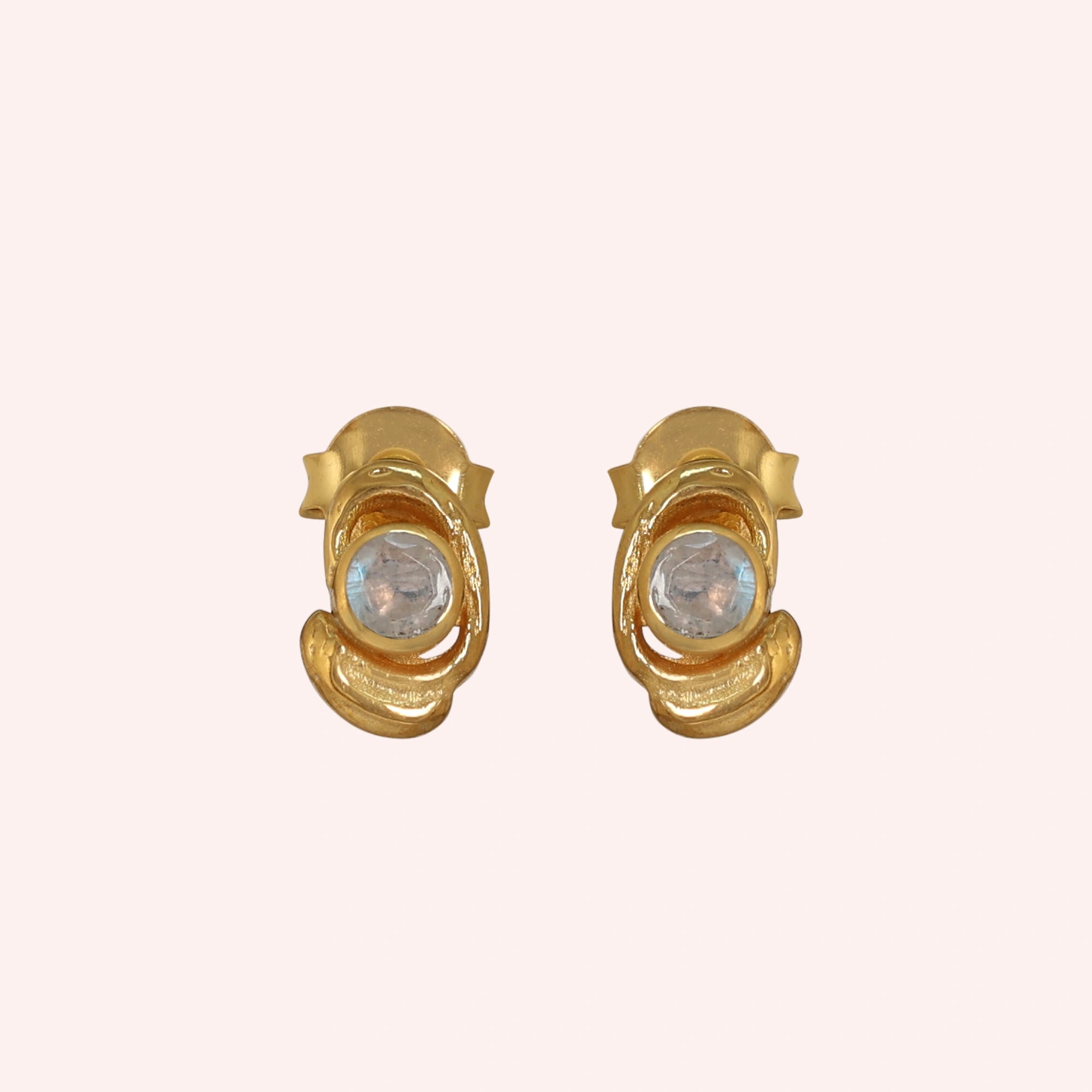 Small-stud-earrings-with-moonstone-gold-plated-silver-front-view-on-soft-pink-background