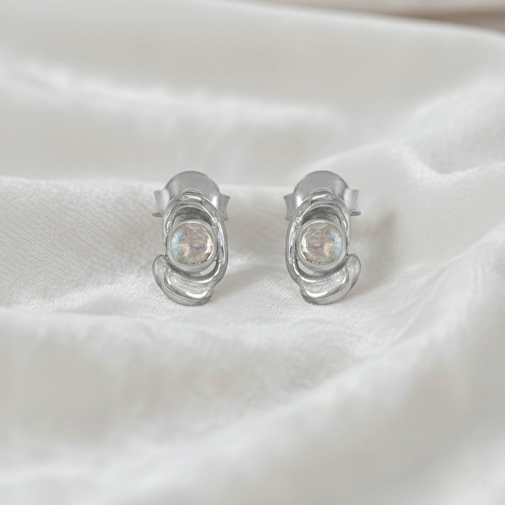 Small-stud-earrings-with-moonstone-sterling-silver-front-view-on-white-satin-background