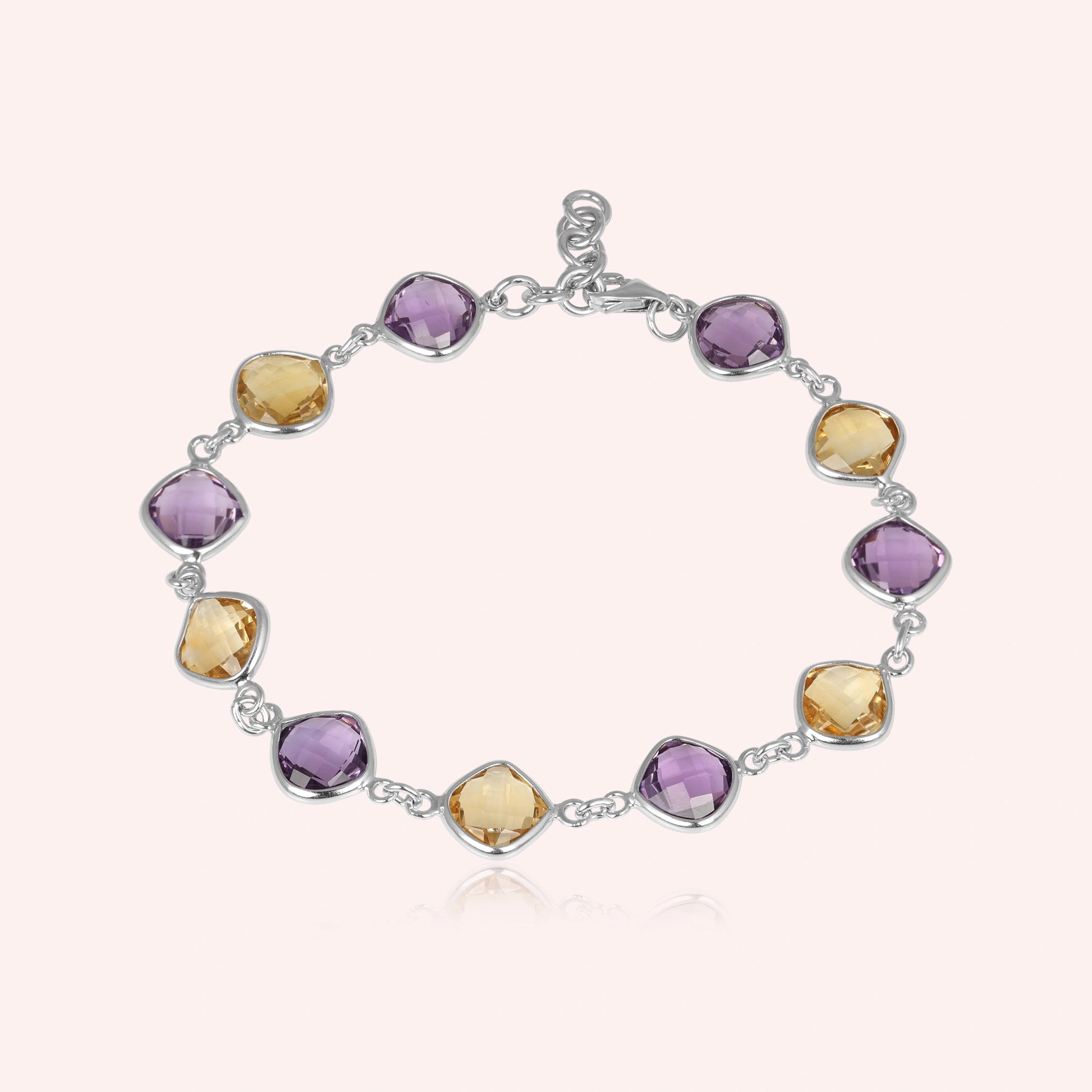 sterling_silver_gemstone_bracelet_top_view_with_faceted_amethyst_citrine_bracelet_on_soft_beige_background_chain_links_clear