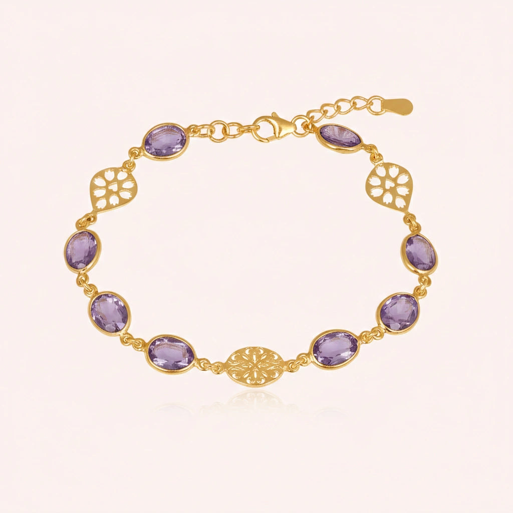 vintage_amethyst_bracelet_top_view_gold_plated_oval_purple_gemstones_amethyst_tennis_bracelet_on_soft_beige_background_shine
